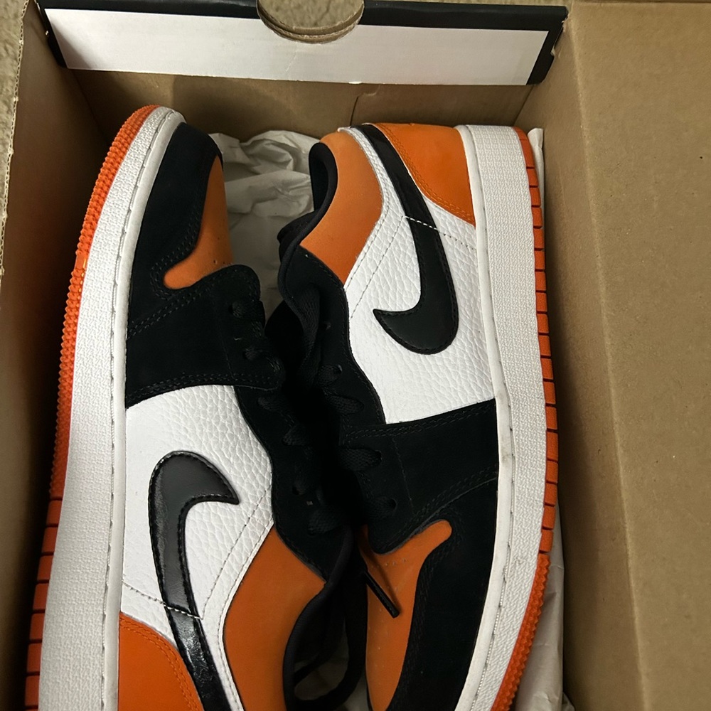 Orange and white Jordan’s